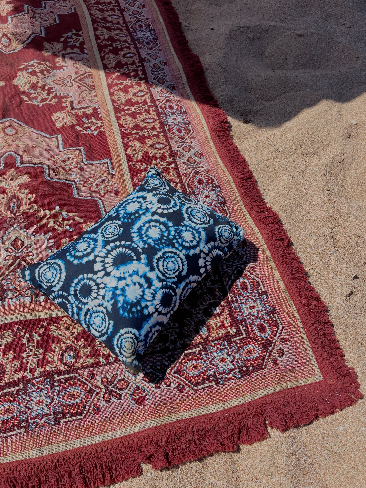 Blue tie-dye beach pillow